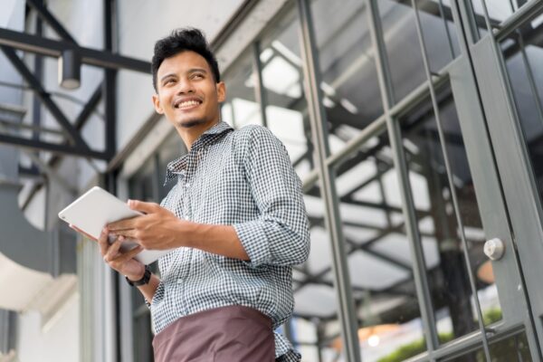 Young entrepreneur reviewing franchise agreement