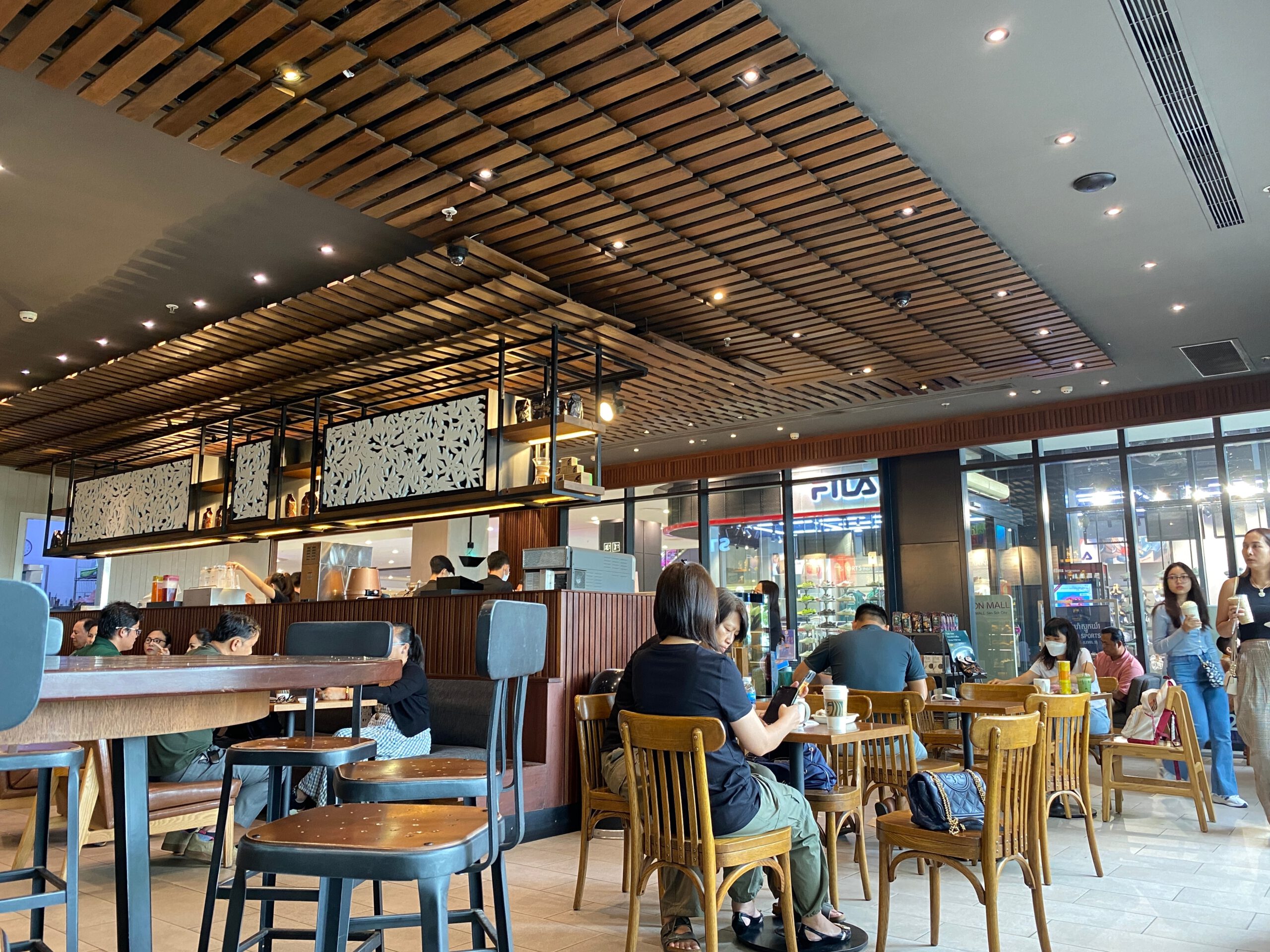 Modern coffee shop in Phnom Penh, Cambodia representing franchise business growth and international expansion